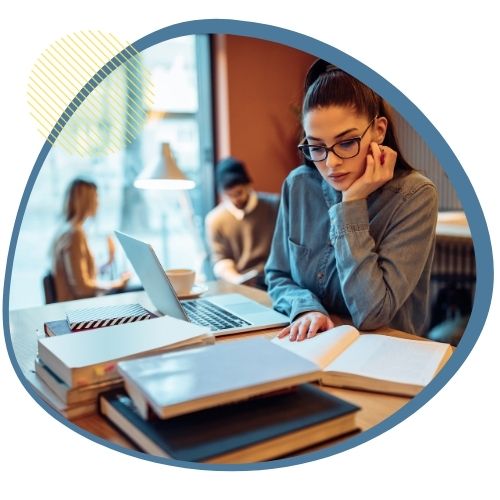 A woman, aspiring to work in Canada, reviewing for the language proficiency tests.